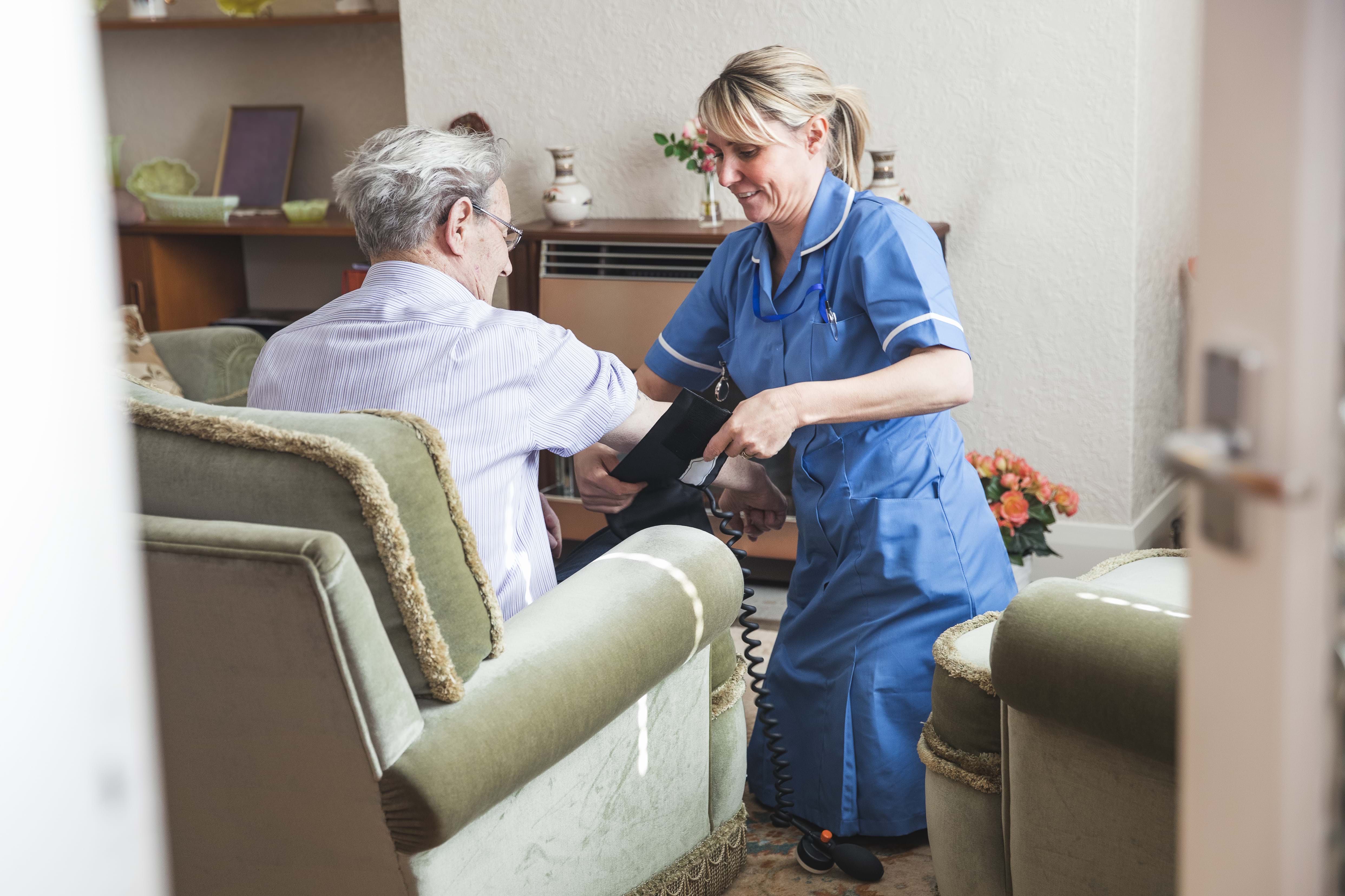 A carer visiting a patient